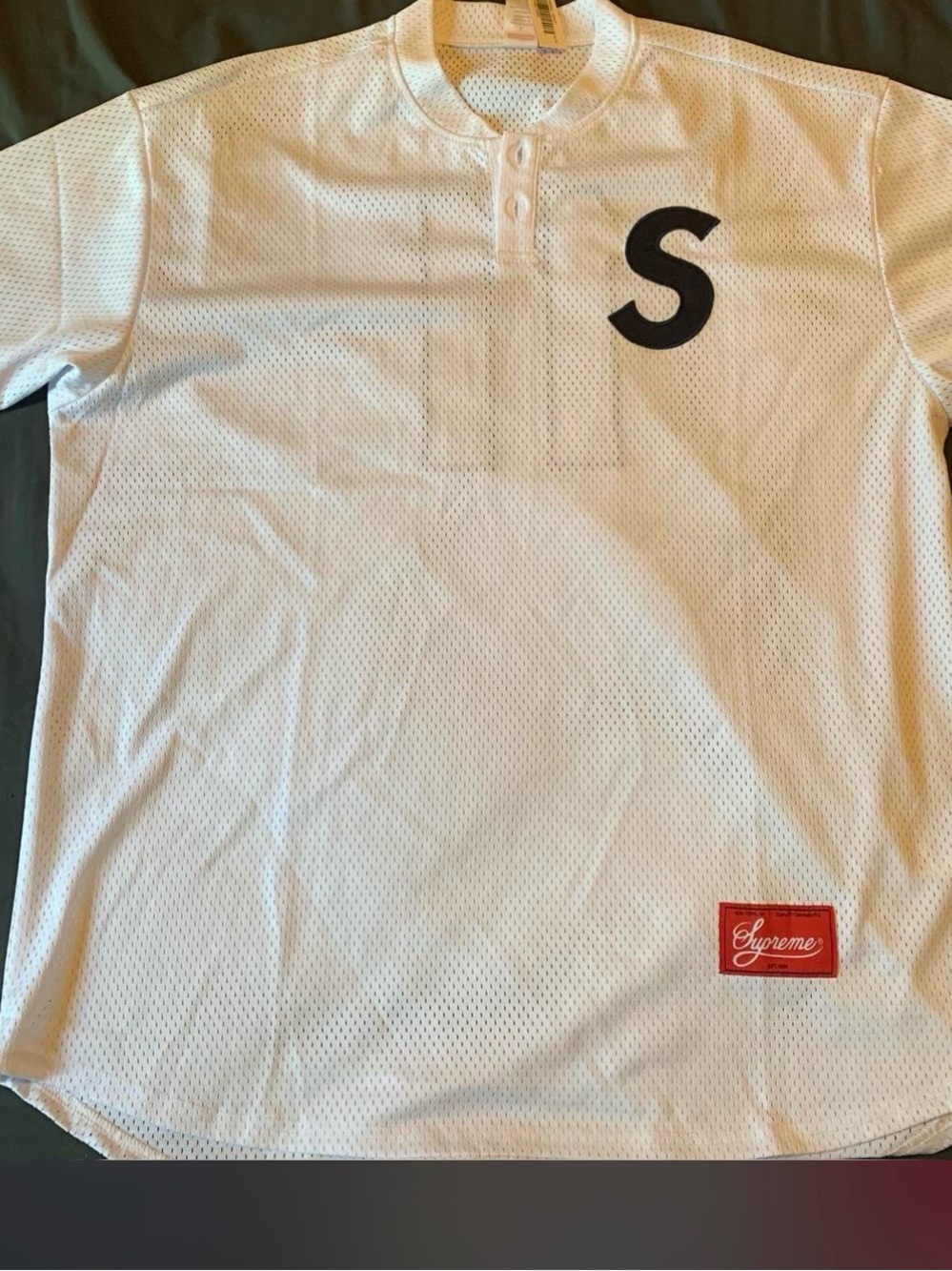 Supreme White Mesh Henley Jersey with Black 'S' and Red Script Patch